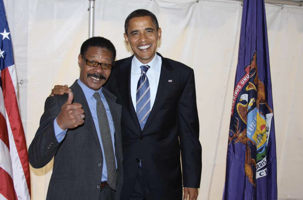Clark Arrington with President Obama in Grand Rapids, MI.