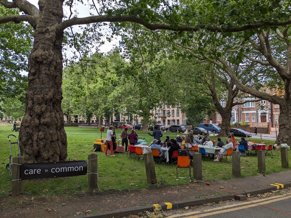Care teams meet in a park.