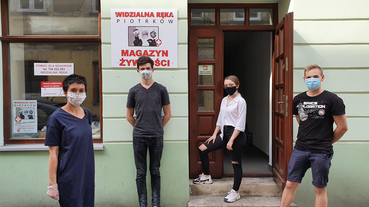 Activists from Widoczna Ręka—Polish for “Visible Hand”—in front of their local headquarters in Piotrkow Trybunalski.