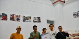 co-op members with rice packs.
