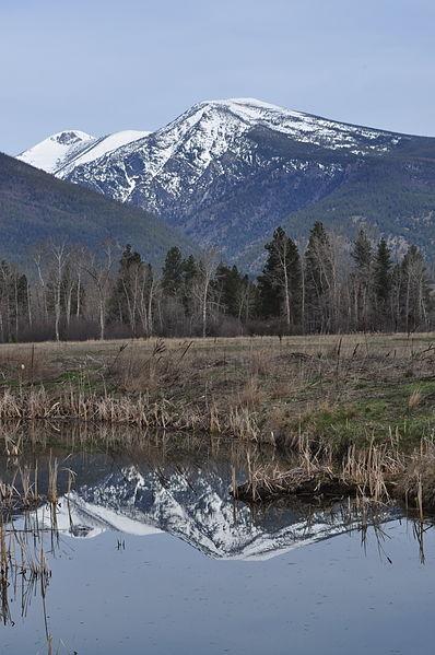 Bitterroot Mountains as seen from the Lee Metcalf Wildlife Refuge, 2011. <a data-cke-saved-href="https://commons.wikimedia.org/wiki/File:Bitterroot-mountains-from-lee-metcalf-wildlife-refuge-near-stevensville-montana-may-2011-rogermpeterson-001_(5882203219).jpg" href="https://commons.wikimedia.org/wiki/File:Bitterroot-mountains-from-lee-metcalf-wildlife-refuge-near-stevensville-montana-may-2011-rogermpeterson-001_(5882203219).jpg" target="_blank">Photo by Roger M. Peterson for USFS Northern Region</a>. CC BY 2.0