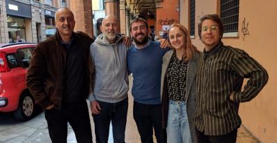 Sito Veracruz (centre) with four other members of FairBnB in front of their office in Bologna