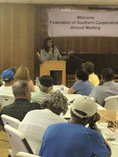 Monica Raigne, Florida State Coordinator of the Federation, addresses attendees at the 2018 Annual Meeting.