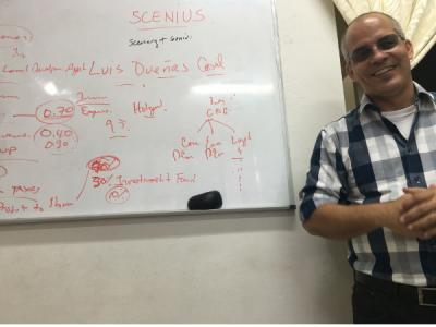 Scenius worker-owner giving a presentation to Center for Global Justice Tour group in 2016. Photo by Ajowa Nzinga Ifateyo